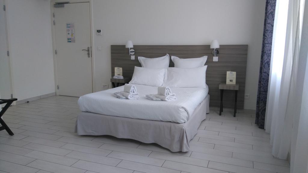 Le Poseidon Hotel ลาแซน-ซูร์-แมร์ ภายนอก รูปภาพ