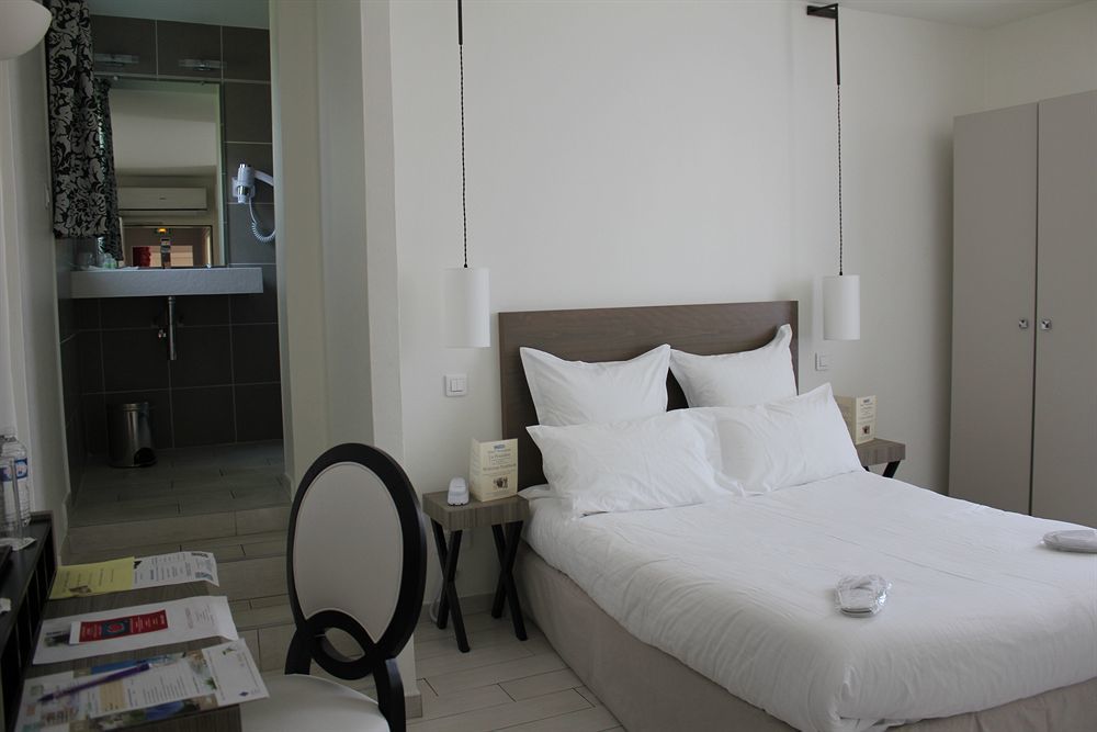 Le Poseidon Hotel ลาแซน-ซูร์-แมร์ ภายนอก รูปภาพ